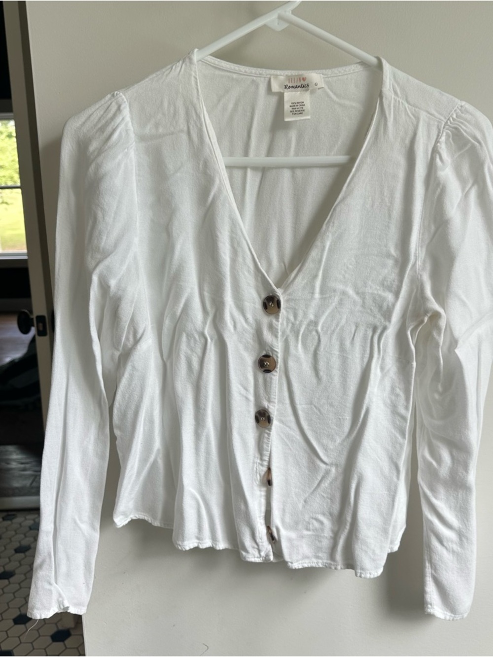 White long sleeve top